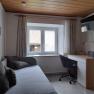 Büroecke und Smart TV mit SAT im Wohnzimmer, © Ferienhaus Leopold Büroecke und Smart TV mit SAT im Wohnzimmer, © Ferienhaus Leopold