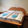 Schlafzimmer Doppelbett, © GasthausSchmidtmayer Schlafzimmer Doppelbett, © GasthausSchmidtmayer