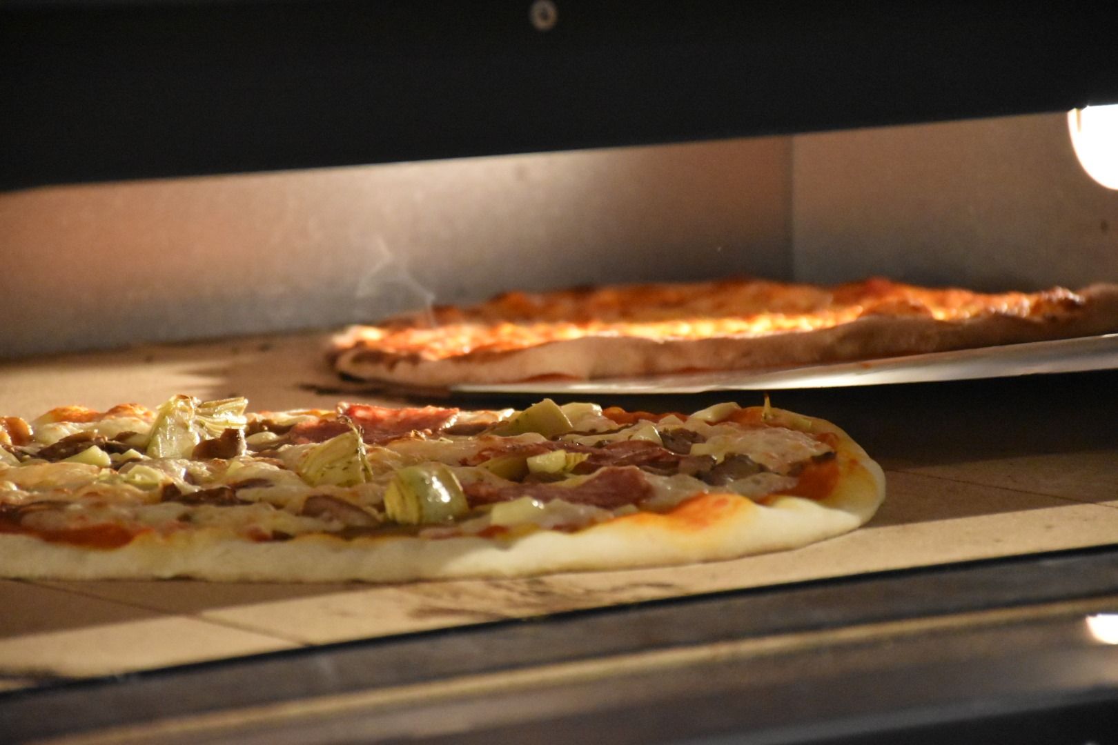 Vynikající pizza v Osteria zum Kirchenwirt