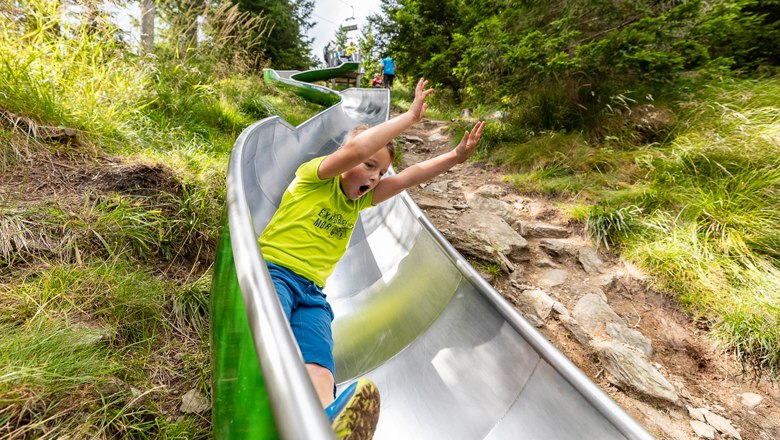 Many attractions, such as the Alm slide, © Erlebnisalm Mönichkirchen, Christian Kremsl