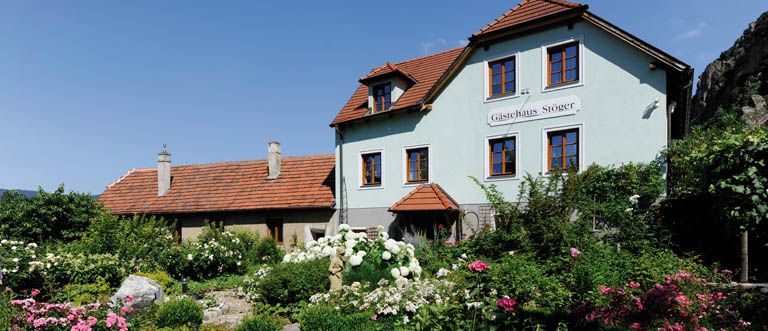 Tradiční dům se zahradou s označením "Gasthaus Stöger".