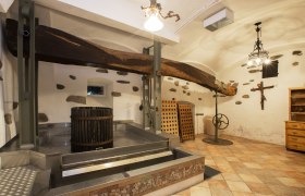 Wine cellar with press at the Kellermandl organic winery, © Monika Loeff