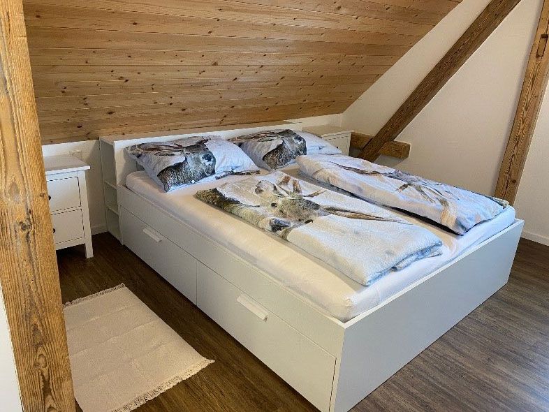 Ložnice s posezením