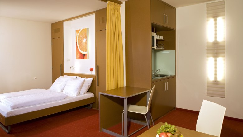 Orange Wings Apartmánový pokoj, © Orange Wings/ Wiener Neustadt