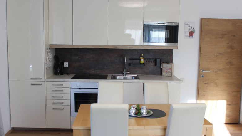 Apartm&aacute;n Angel - kuchyňsk&yacute; kout s j&iacute;delnou, &copy; &copy; HomeW4, Sonja Wiesinger