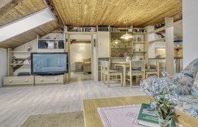 Spacious living room with kitchen area, © Andreas Biedermann